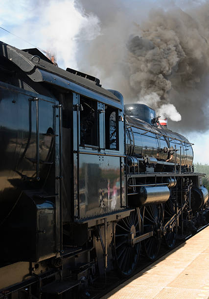 istock Vintage train taking off on sunny day 147021374