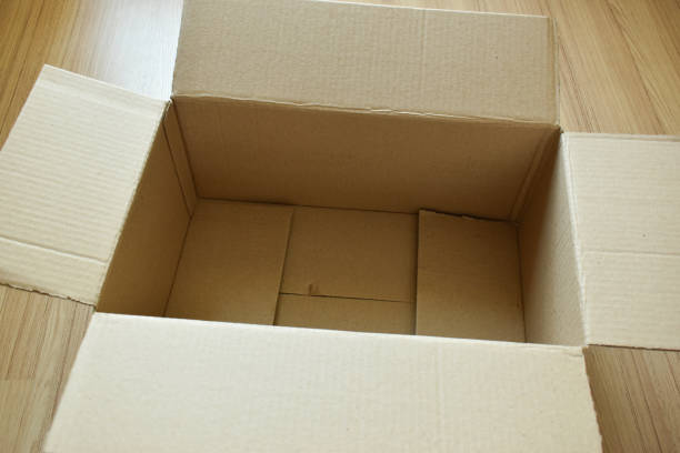 istock brown post box packaging put on wood floor 1470214783