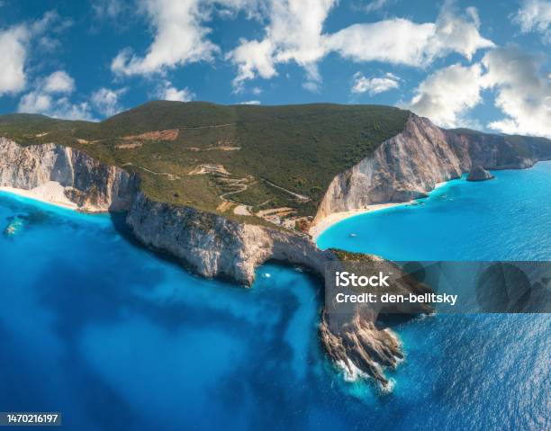 Aerial View Of Blue Sea Mountains Sandy Beach At Sunny Day In Summer Panorama Porto Katsiki Lefkada Island Greece Beautiful Landscape With Sea Coast Rocks Water Sky With Clouds Drone View Stock Photo - Download Image Now