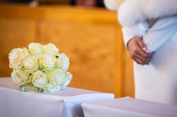 istock hands, wedding rings and marriage vows 1470220770