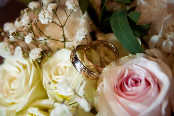 istock hands, wedding rings and marriage vows 1470220804