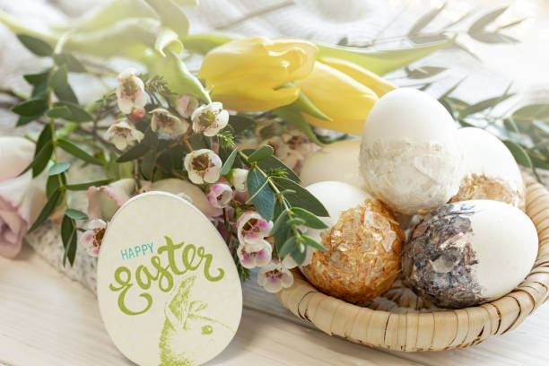 istock Easter composition with decorative eggs and flowers, close-up. 1470222095
