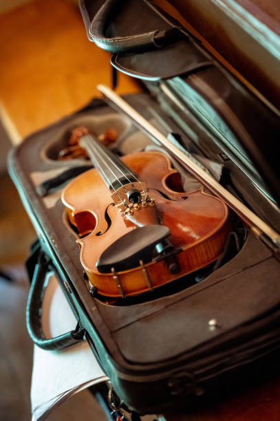 istock wooden violin in case 1470222467