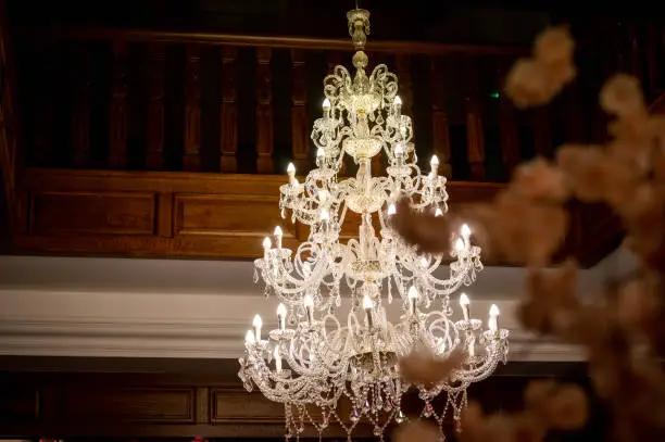 crystal chandelier in a wooden banquet hall wedding hall crystal chandelier above the dance floor