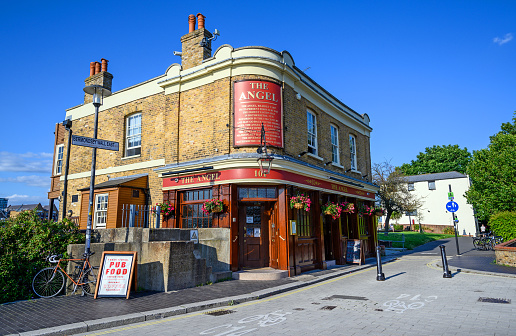 The Angel pub in Rotherhithe, London, UK. The Angel is a traditional British public house on Bermondsey Wall East by the banks of the River Thames.