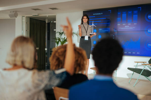 istock Speaker at conference answering audience questions. 1470229388