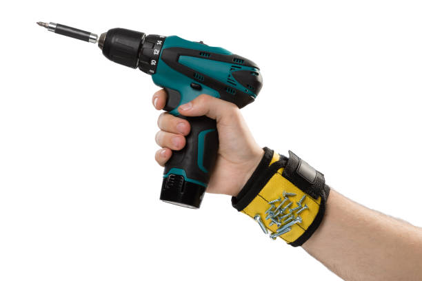 istock Hand of a worker with a screwdriver on a white background. 1470231567