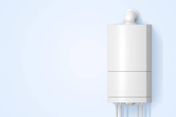 istock Boiler water heater with plastic tubes on blue wall background 3d render. Home plumbing, realistic mockup of gas or electric fixture, modern household central heating system equipment 1470234387