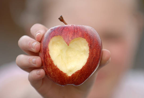 istock Apples and carved heart 147023525