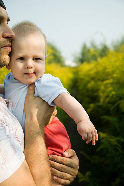 istock father and son on sunny summer day 147023732