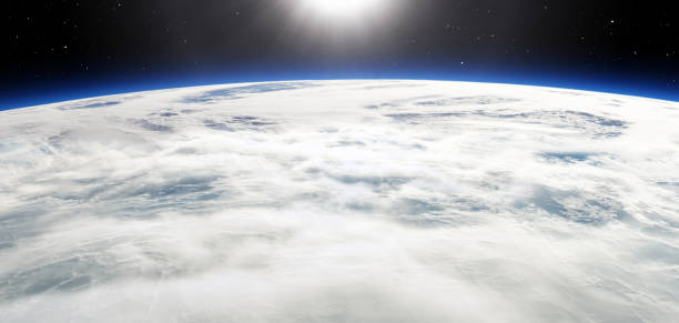 istock Earth sunrise with clouds, sun and stars 1470238348