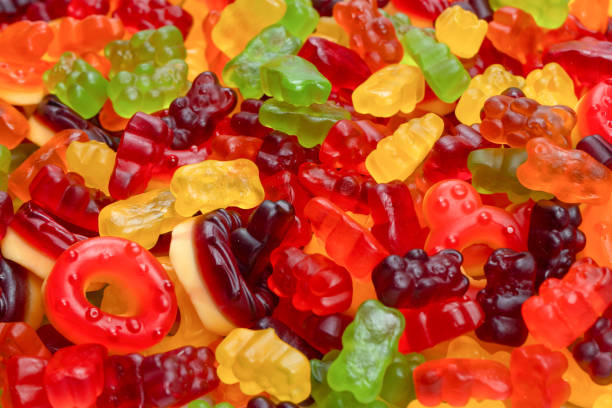 istock Assorted colorful gummy candies. Jelly donuts. Jelly bears. 1470238537