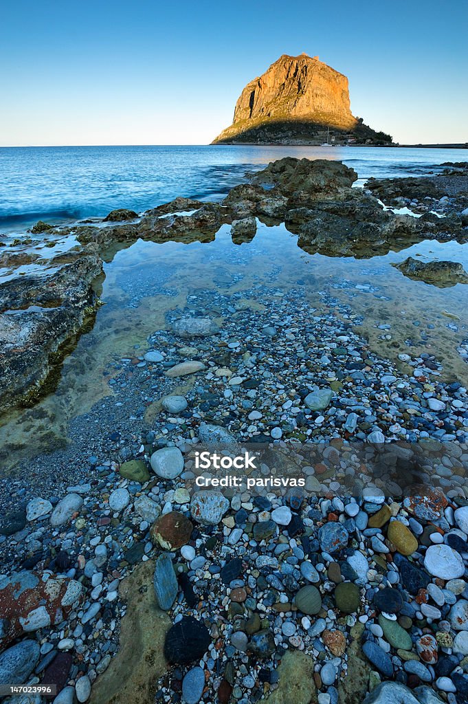 Monemvasia at late afternoon seascape with Monemvasia rock at the background Blue Stock Photo