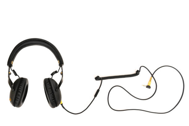 istock Black headphone with wire isolated on white background. 1470241017