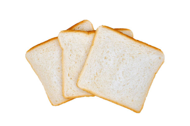 Three pieces of white wheat bread, isolated on a white background