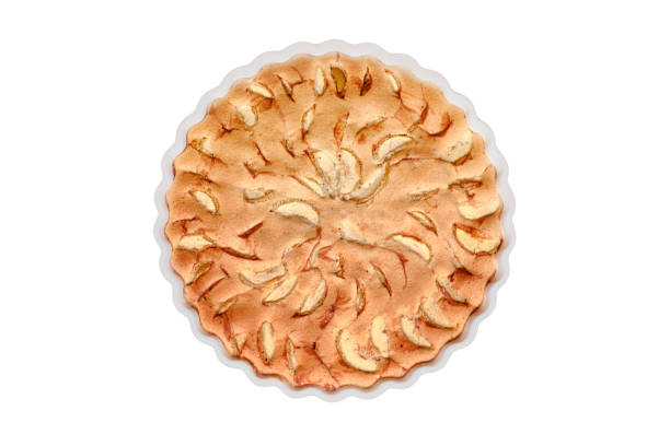 istock Home baking ripe apples, isolated on a white background. Apple pie with walnuts and almonds, isolated on a white background. Fruit cake with nuts 1470241330