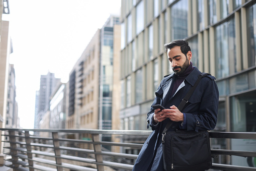 Mid adult Arab man working as a businessman. About 35 years old, Caucasian male.