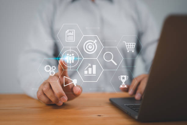istock Target customer concept for marketing plan & strategies: buyer persona, behavior, personalization, customer-centric. Businessman touches screen to target customer. 1470245936