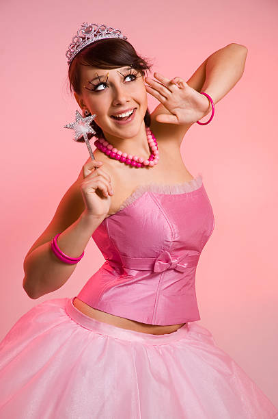 The beautiful fairy on a pink background stock photo