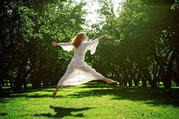 istock Young girl dancing in the garden 147024989