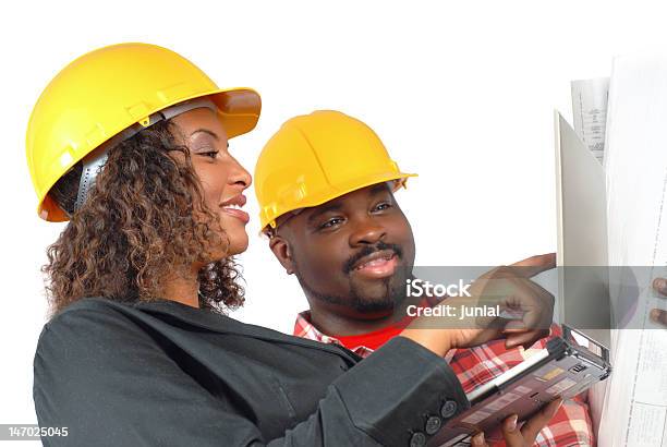 Foto de Construtores Falando e mais fotos de stock de Afro-americano - Afro-americano, Trabalhador de Construção, Origem Africana