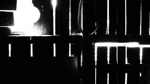 istock Gaps in Wooden Wall, Backlit 1470250857