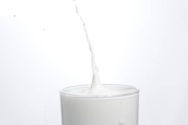 istock Drop in glass of milk 1470252213