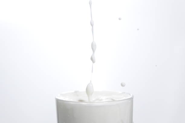 istock Drop in glass of milk 1470252218