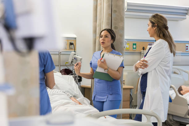 istock Female nurse talks to her unseen peers about why she took certain steps during class 1470253305