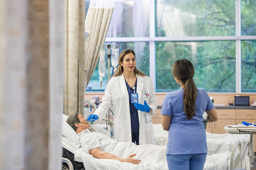 O2 Mask Placement Hospital Trainer Gestures While Talking To The Intern About Oxygen Mask ...