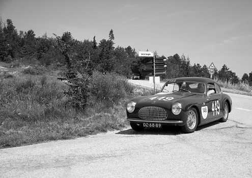 urbino, Italy – June 16, 2022: CISITALIA 202 SC BERLINETTA PININ FARINA 1948 on an old racing car in rally Mille Miglia 2022