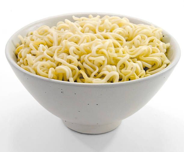 istock Cooked instant noodles in a white bowl 147025703