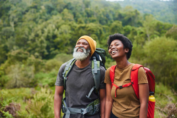 istock Couple smiling while enjoying a scenic view during a hike 1470260015
