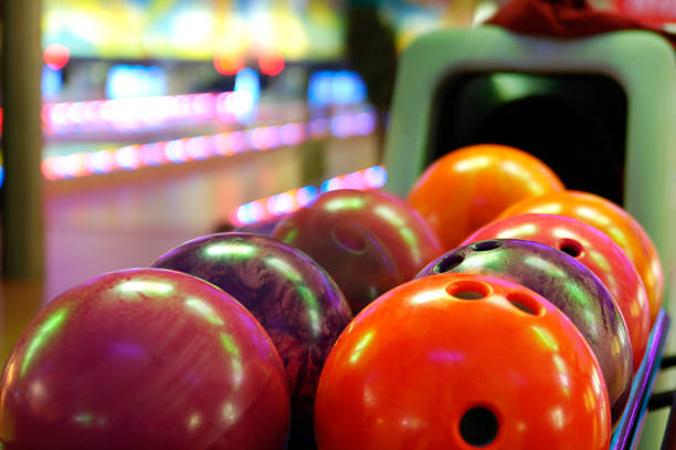 istock Bowling balls at bowling alley lined up 147026125