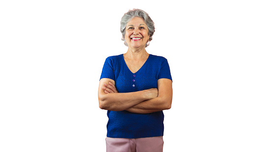 Smiling Mature Woman Pointing Isolated on Orange Background