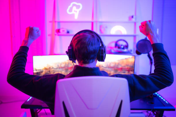 istock Gamer holding his head with both hands and having a frustrated mood unpleasant when playing a game losing to an opponent 1470265097