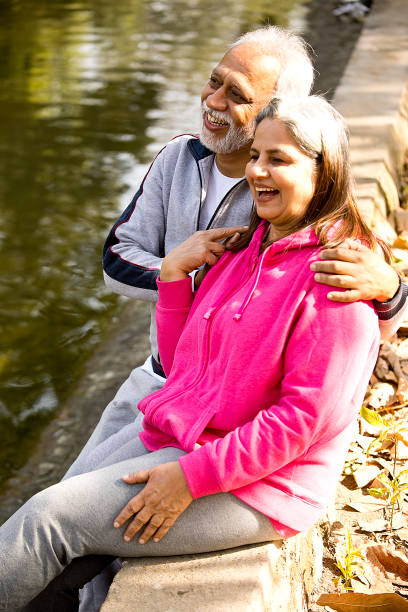 istock Old couple admiring view from lakeshore 1470265194