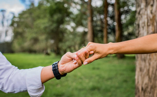 istock wedding couple getting engaged outdoors 1470268244