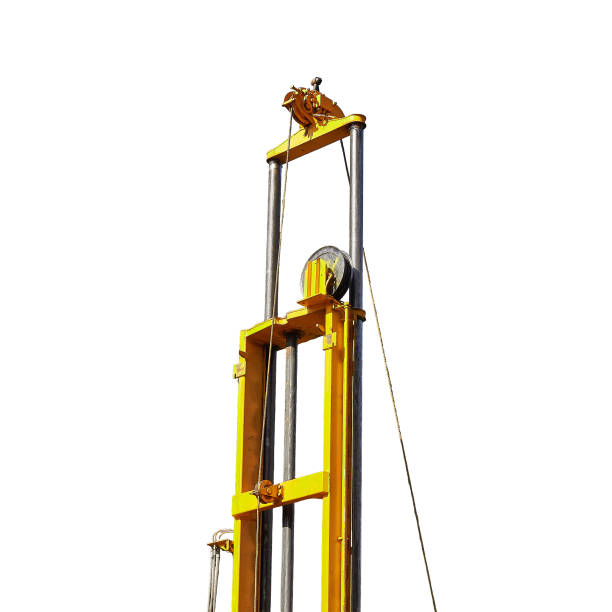 istock Rotating the winch of the drilling device Work on drilling wells, isolated on a white background. Drilling rig engineers geologists on a large car. 1470268293