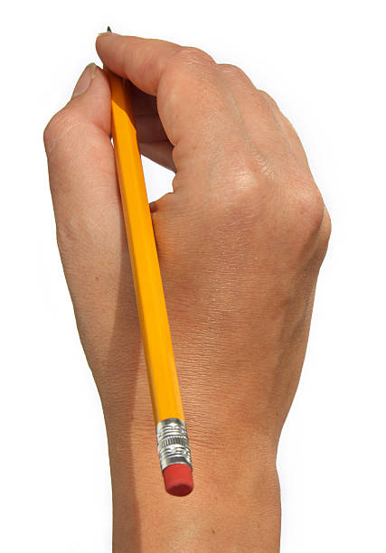 Hand with pencil stock photo