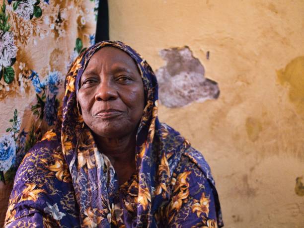 An old african woman portrait looking at the camera
