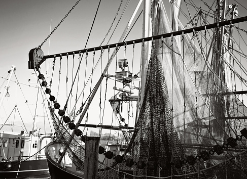 In the cutter port of Greetsiel at North Sea, East Frisia, Lower Saxony, Germany - 2023