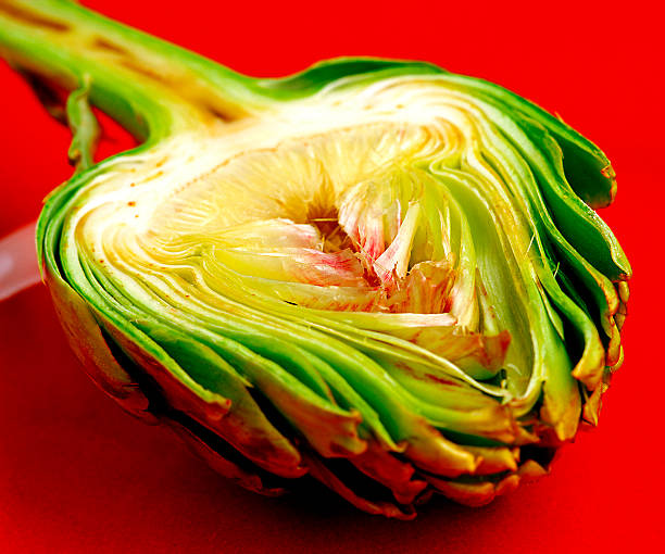 Artichoke on the red plate stock photo