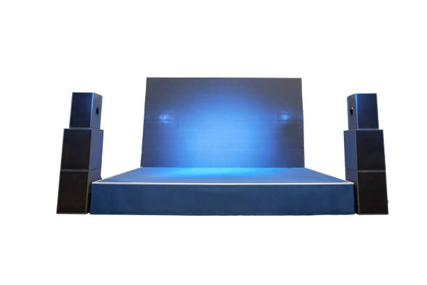 Empty small blue stage for concerts with speakers, isolated on a white background
