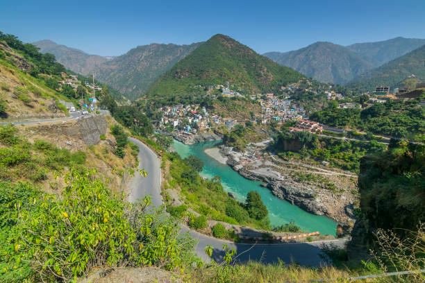 istock Curvy road at Devprayag, Godly Confluence,Garhwal,Uttarakhand, India. Here Alaknanda meets the Bhagirathi river and both rivers thereafter flow on as the Holy Ganges river or Ganga. 1470286685