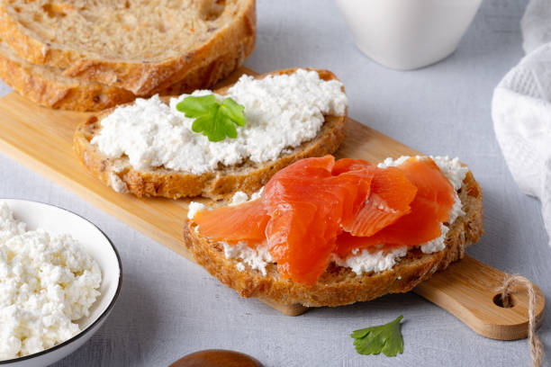 istock Sandwich with salted salmon and cream cheese on rustic background 1470287142