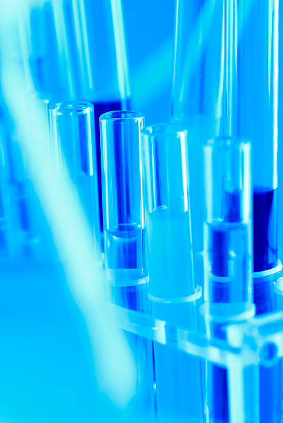 istock Experiment in a laboratory glass test-tubes 147028776