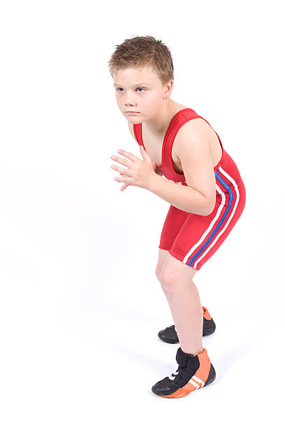 Youth Wrestler 10 year old posing in wrestling singlet wrestlers uniform stock pictures, royalty-free photos & images