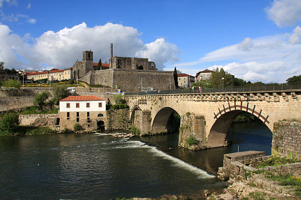 Old historical part of Barcelos city, Portugal, under cloudy blue sky