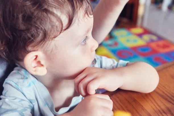 istock Toddler eating food 1470290806